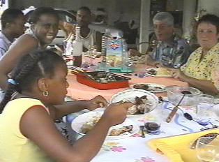 People eating food around the table