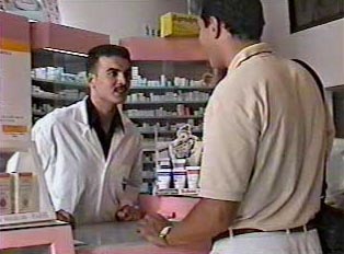 Someone making a purchase at a pharmacy