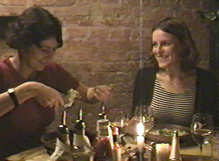 Two people eating dinner together