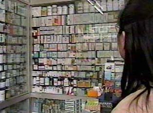 A person browsing at a pharmacy