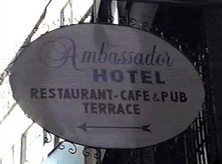 A sign that reads 'Ambassador Hotel: Restaurant, Cafe & Pub, Terrace'
